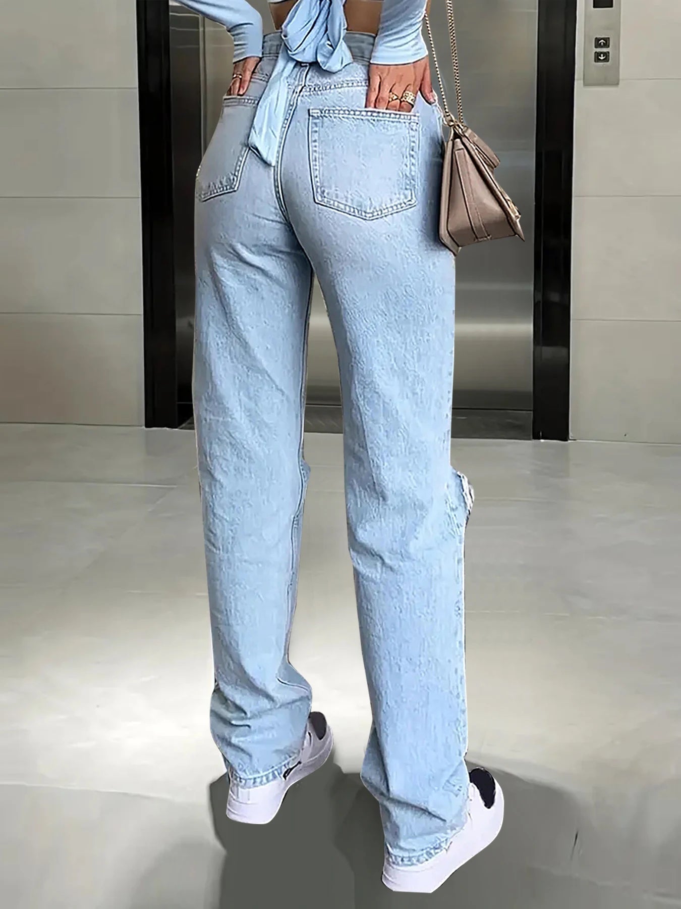 HIGH WAISTED RIPPED JEAN IN LIGHT BLUE